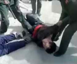Chinese beating Tibetans